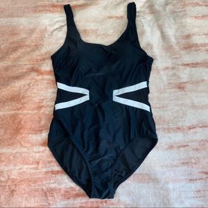 One piece swimsuit with mesh triangles